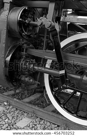 Old german steam locomotive, built in 1940, in a museum. The heaviest locomotive, 85 tons, that circulated in Romania during the Second World War. Detail and close up of huge wheels. B & W processing. Photo stock © 