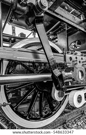 Old german steam locomotive, built in 1940, in a museum. The heaviest locomotive, 85 tons, that circulated in Romania during the Second World War. Detail and close up of huge wheels. B & W processing. Photo stock © 