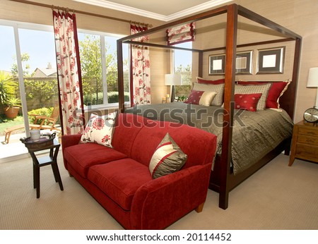 Elegant master bedroom with canopy bed