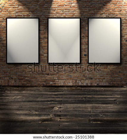 Three empty frames in a room against a white brick wall