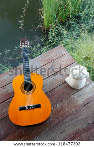 guitar acoustic in the wood floor