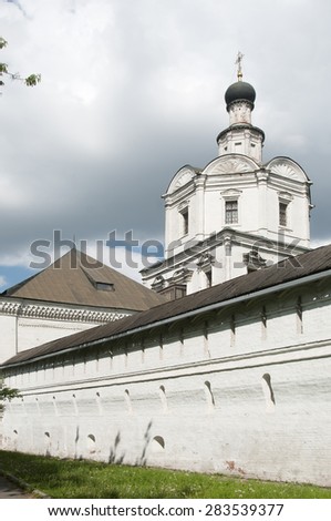 MOSCOW, RUSSIA, MAY 30, 2015 Andronikov Monastery of the Saviour, the  monastery wall and The Archangel Michael church