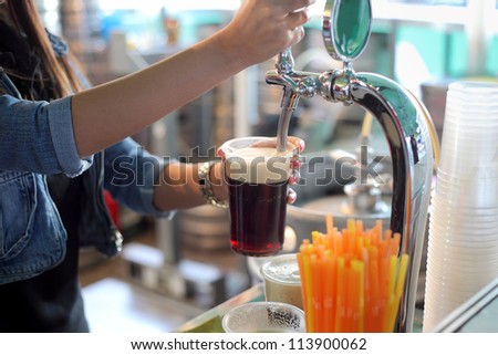 Similar – Foto Bild Kellnerin zapft Zapfhahn-Bier in einer Bar