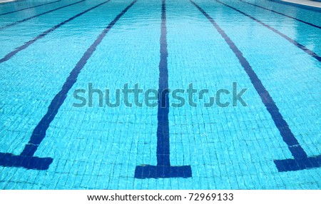 Detail from open air olympic swimming pool, water and lines