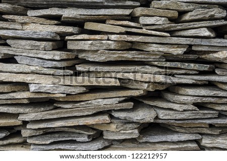 Stacked stone tiles for exterior use.
