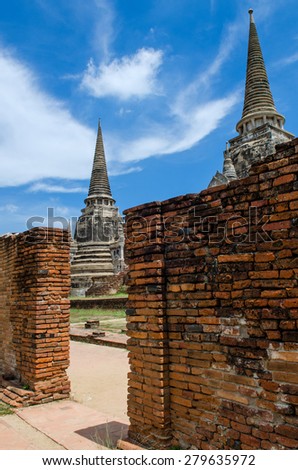Antique Brick wall with Great Pagoda background in Ayutthaya Historical Park.Public Place