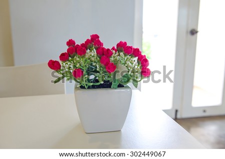 Bouquet of pink roses flower in vase. Artificial flower.