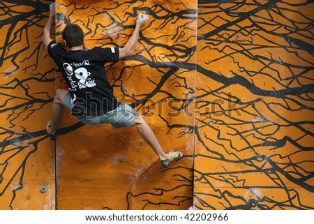SANTIAGO, CHILE - DECEMBER 4: A contestant climbs the wall of Lippi 9th Boulder, wall climbing competition on December 4, 2009 in Santiago, Chile.