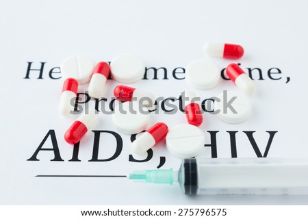 Syringe and Pills on Aids, Hiv