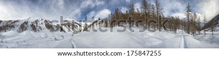 High mountain snow path in winter time sunny view huge landscape