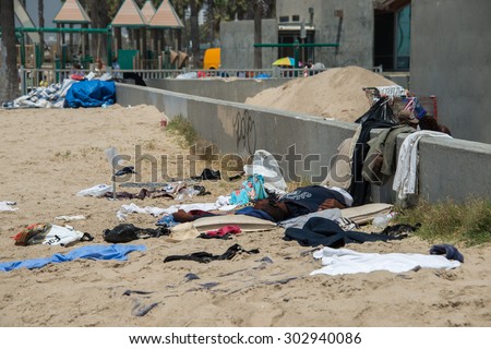 LOS ANGELES, USA - AUGUST 5, 2014 - homeless in venice beach in los angeles