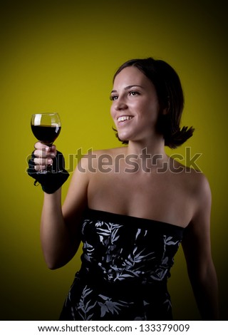Pretty happy retro girl drinking red wine