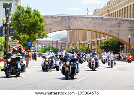 WASHINGTON, DC, USA - MAY 25: Motorcycles travel on Independence Avenue as part of the annual Rolling Thunder motorcycle ride for American POWs and MIA soldiers on May 25, 2014 in Washington, DC, USA