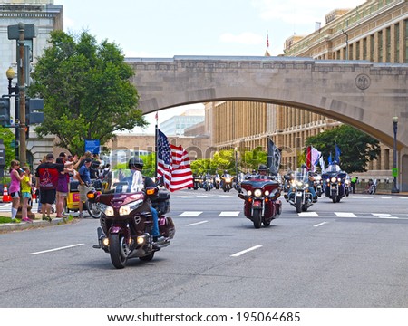 WASHINGTON, DC, USA - MAY 25: Motorcycles travel on Independence Avenue as part of the annual Rolling Thunder motorcycle ride for American POWs and MIA soldiers on May 25, 2014 in Washington, DC, USA