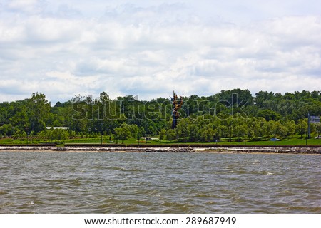 Waterfront landscape at National Harbor, Maryland, USA. Cloudy sky on a summer day in July over Oxon Hill in Prince George's County, Maryland, United States.