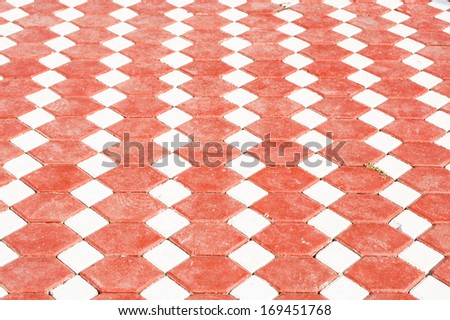 tiled floor in red and white background