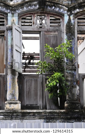 Facade from old chinese warehouse in the old George Town, Penang, Malaysia.