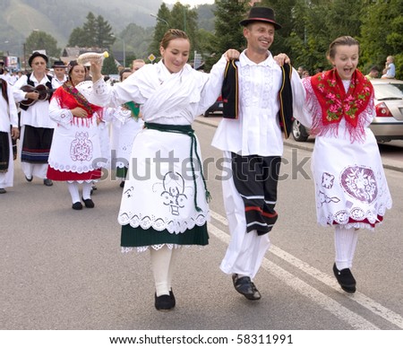 SZCZYRK, POLAND–AUGUST 1: Participants of the 47th Beskidy Highlanders Week of Culture (TKB), the biggest folk culture event in Eastern Europe, parade through the city, folk group from Croatia on August 1, 2010 in Szczyrk, Poland