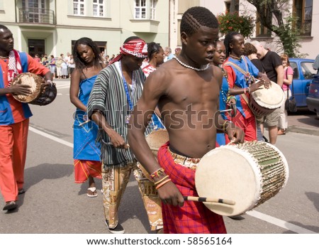 ZYWIEC, POLAND - AUGUST 5:  Participants of the 47th Beskidy Highlanders Week of Culture (TKB), the biggest folk culture event in Eastern Europe, parade through the city, folk group from Kenya on August 5, 2010 in Zywiec, Poland