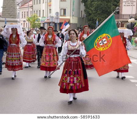 ZYWIEC, POLAND - AUGUST 5:  Participants of the 47th Beskidy Highlanders Week of Culture (TKB), the biggest folk culture event in Eastern Europe, parade through the city, folk group from Portugal on August 5, 2010 in Zywiec, Poland
