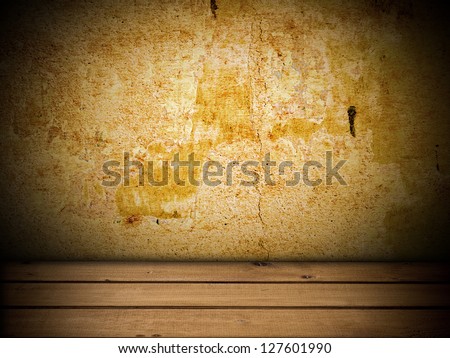 old grunge basement wall with wooden floor