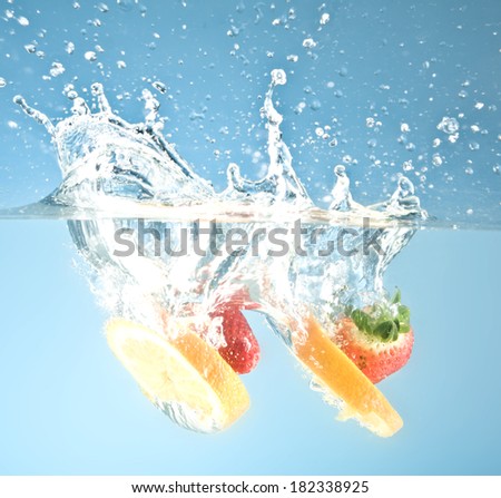 fruits splashed into water