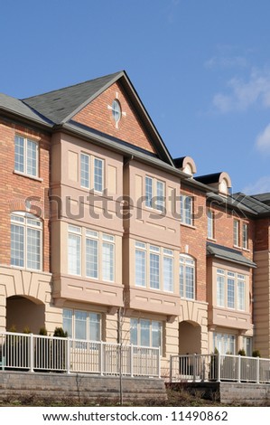 Row of new houses - vertical format