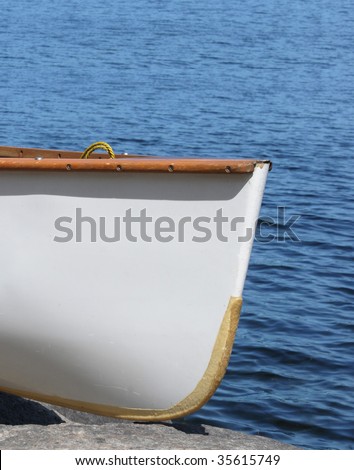 Bow of a white canoe