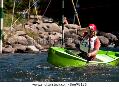 MINDEN, ONTARIO, CANADA - SEPT. 11: An unidentified contestant competes at Open Canoe Slalom Race, 2011 at Gull River in Minden, Ontario, Canada on September 11, 2011.