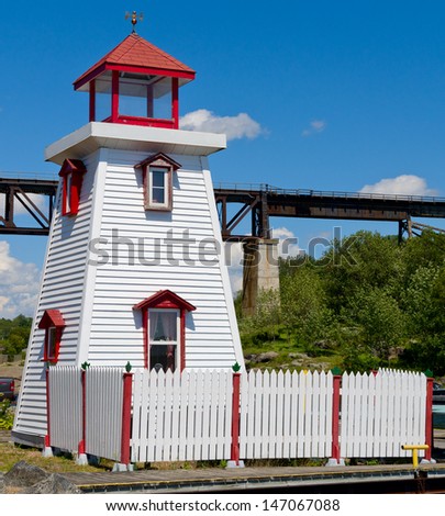 Lighthouse and railway bridge in Parry Sound, Ontario