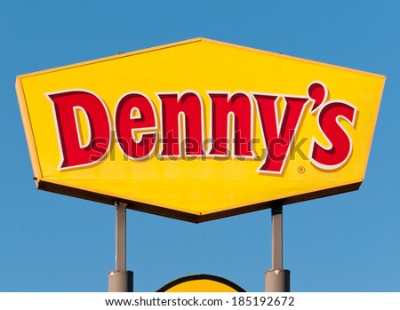 WEST PALM BEACH, FLORIDA - JANUARY 20: Denny\'s restaurant sign against blue sky on January 20, 2012 in West Pam Beach, Florida. Denny\'s operates over 1650 restaurants in many countries.