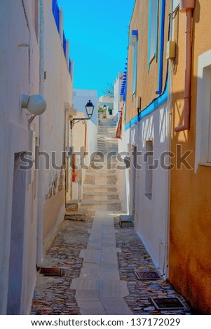 Greece Siros, traditional view of narrow streets and tiny walk paths in chora, Siros is a Greek islands in Cyclades