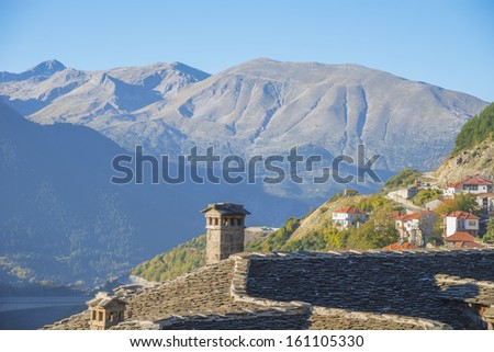 Landscape view of a village with houses  in the fall with all the colorful foliage in Grecee Metsovo