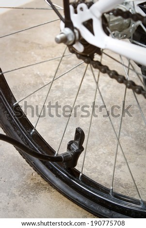 Broken bicycle wheel, closeup photo of some bicycle parts.