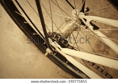 Closeup photo of some bicycle parts, broken bicycle wheel.
