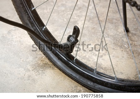 Broken bicycle wheel, closeup photo of some bicyicle parts