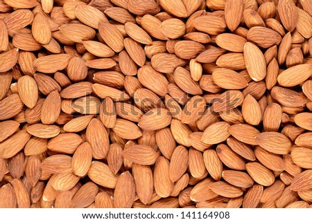 Peeled almonds background