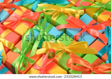 Top view of colorful gifts as background
