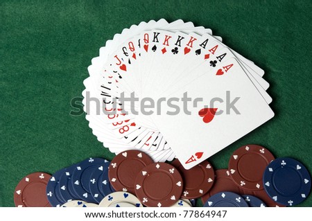 The image of cards and counters for game in poker