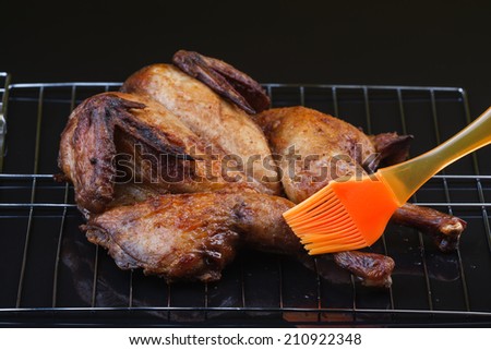 whole roasted chicken on an oven rack