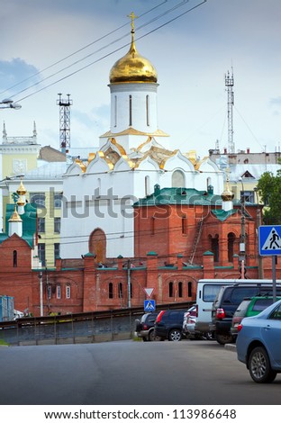 IVANOVO, RUSSIA - JUNE 27: View of Ivanovo - Trinity temple and Post Office on June 27, 2012 in Ivanovo, Russia. In 2000 construction began on temple of Holy Trinity. Now final stage of construction