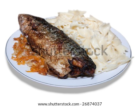 Fried gold mackerel and macaroni on dish. Isolated