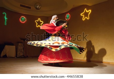 MARSA ALAM, EGYPT - DECEMBER 31: Traditional oriental dance. Celebration New Year eve event on December 31, 2009 in Azur Pencee Hotel Resort, Marsa Alam, Egypt.