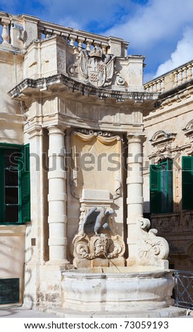 fountain with sculpture at Palace square in Valletta. Malta