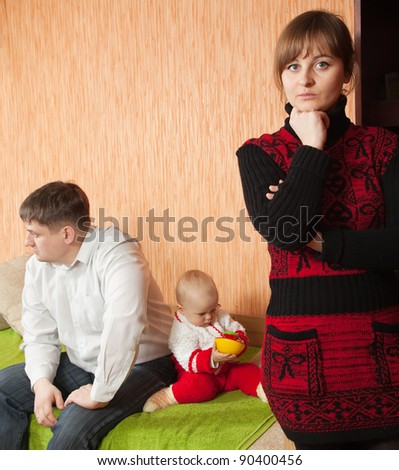 Family of three having quarrel at home