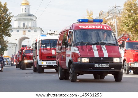 VLADIMIR, RUSSIA - SEPTEMBER 15: City Day  event September 15, 2012 in Vladimir, Russia.  Fire trucks in carnival procession  dedicated to the 1022 anniversary of Vladimir city