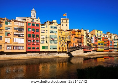 GIRONA, CATALONIA - JULY 1: Bridge over river Onyar in July 1, 2013 in Girona, Catalonia. One of the oldest cities in Europe with a well-preserved medieval buildings.  Population: 96,722 (2011 Census)