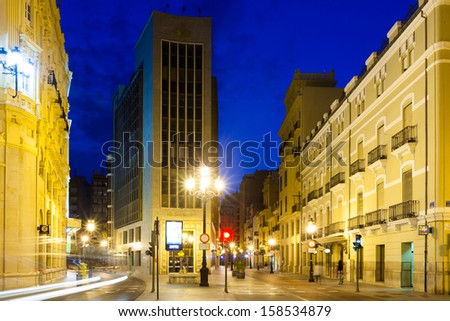 CASTELLON DE LA PLANA, SPAIN - AUGUST 25: Commercial street in evening on August 25, 2013 in Castellon de la Plana, Spain. City is located in east of Iberian Peninsula. Population (2012): 180,204