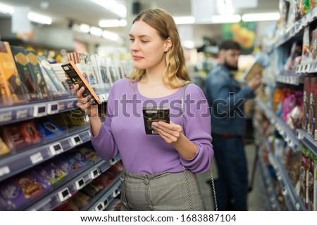 Image, Stock Photo Woman buying sweets in cupcakery