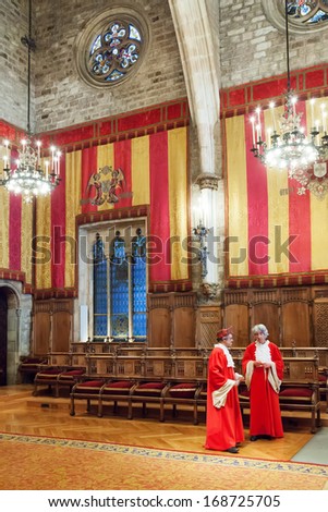 BARCELONA, CATALONIA - APRIL 23: Gothic architecture of Barcelona city hall in April 23, 2013 in Barcelona, Catalonia.  Hall named Council of One Hundred (Salo de Cent)  dated 1369 - 1373